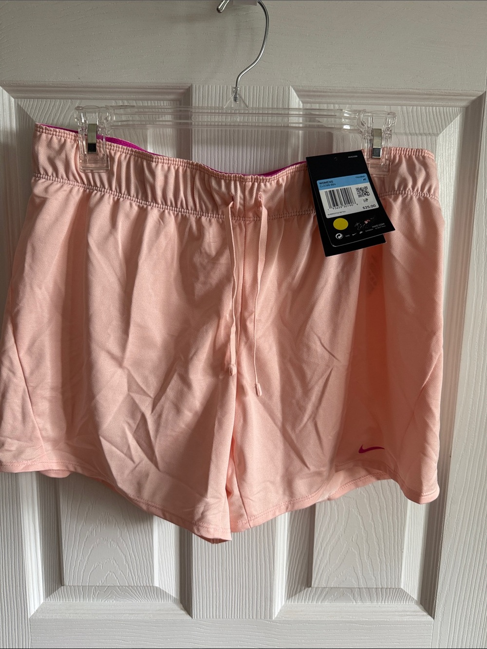 Nike Women's Light Pink Athletic Shorts with Drawstring